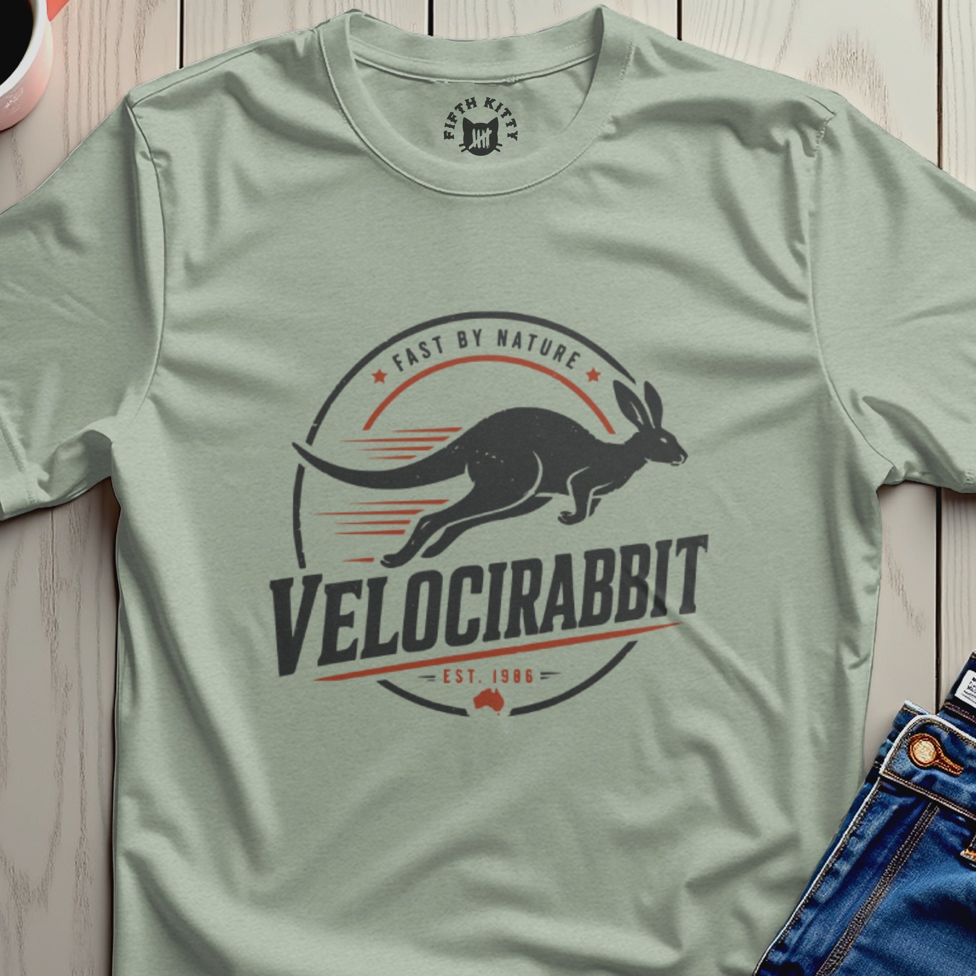 T-shirt with a graphic of a running kangaroo and text "VELOCIRABBIT FAST BY NATURE EST. 1986."