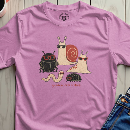 Pink t-shirt with cartoon bugs and snails wearing sunglasses and text "garden celebrities."