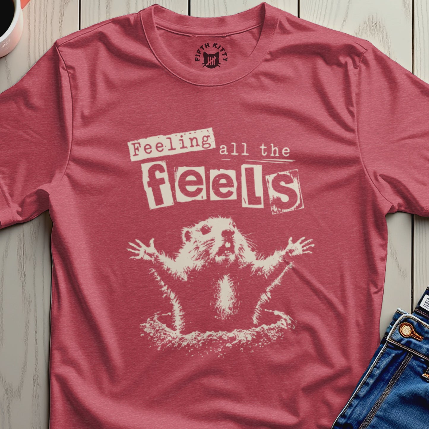 Mascot raising arms with text "Feeling all the feels".