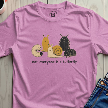 Pink t-shirt with cartoon bugs and text "not everyone is a butterfly".