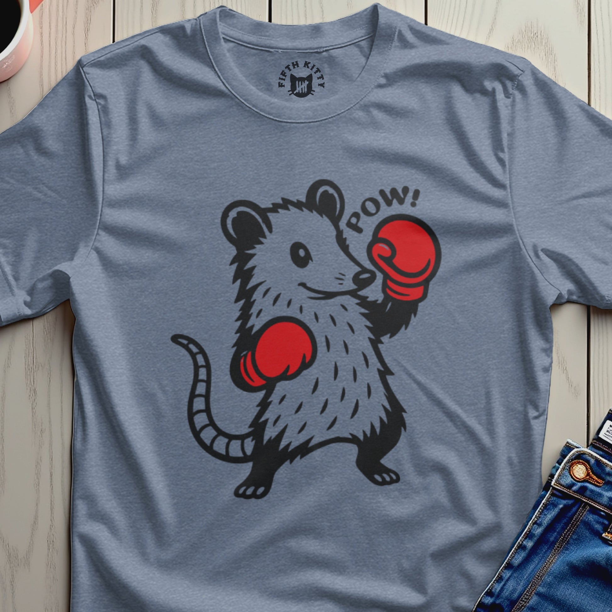 Gray t-shirt with a cartoon opossum wearing red boxing gloves that says "POW!"