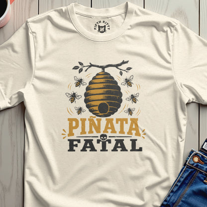 T-shirt with beehive graphic, bees, and "Piñata Fatal" text.
