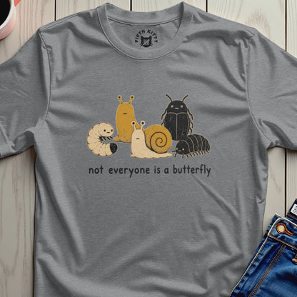 Grey t-shirt with cartoon bugs and the text "not everyone is a butterfly".