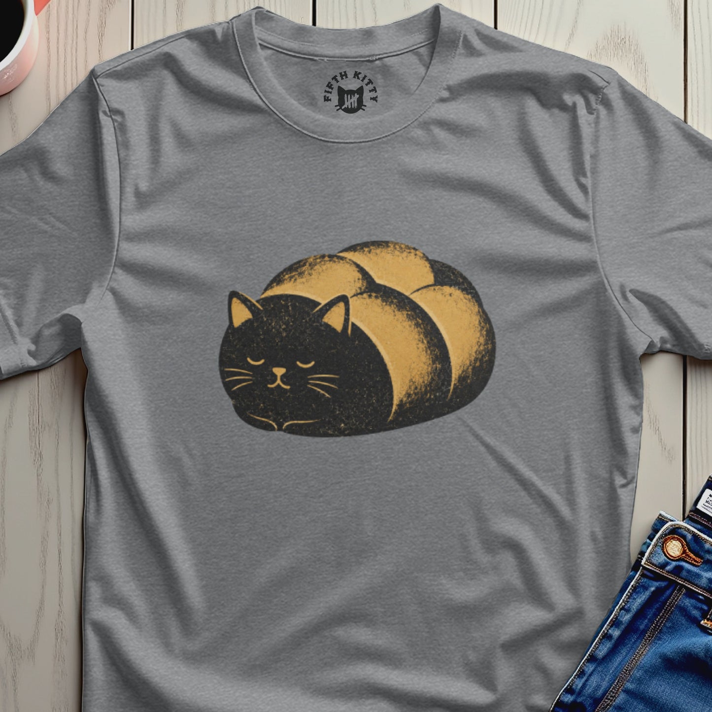 Black and tan cat loaf graphic on a grey t-shirt with Fifth Kitty logo