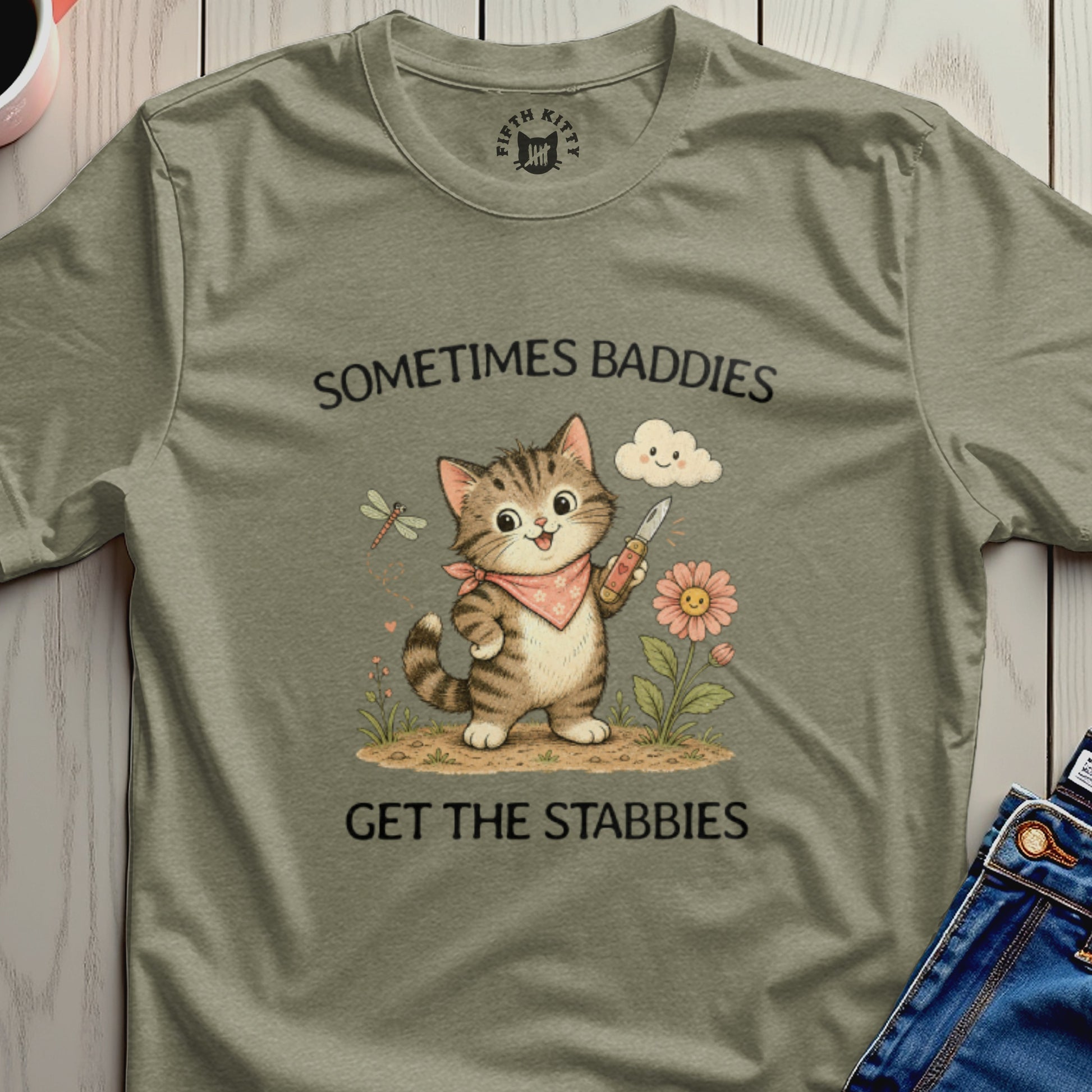 Cat with knife and text "Sometimes baddies get the stabbies".