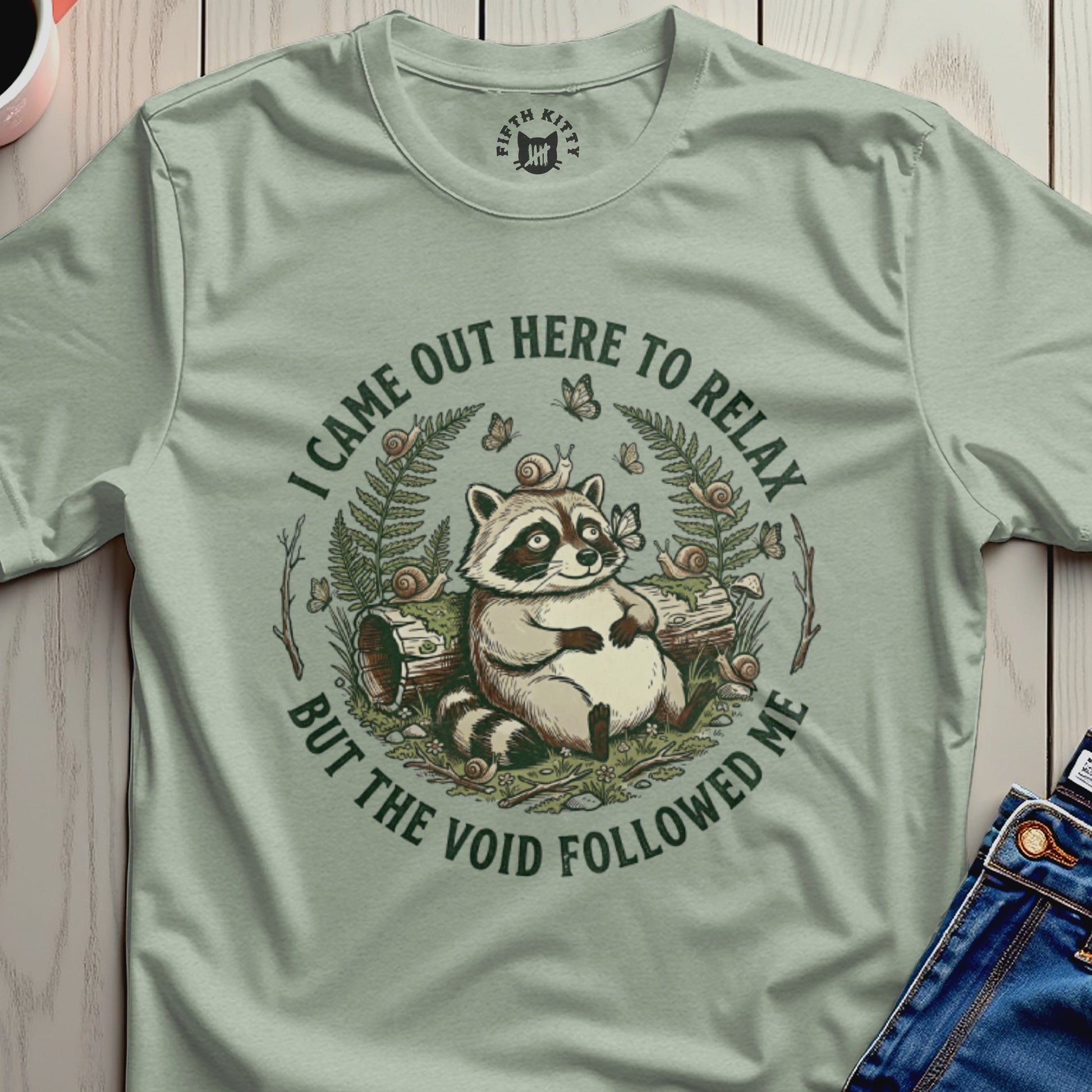 Raccoon sitting with snails, text "I came out here to relax but the void followed me."