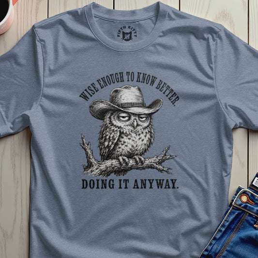 Owl in cowboy hat with text "Wise enough to know better. Doing it anyway."