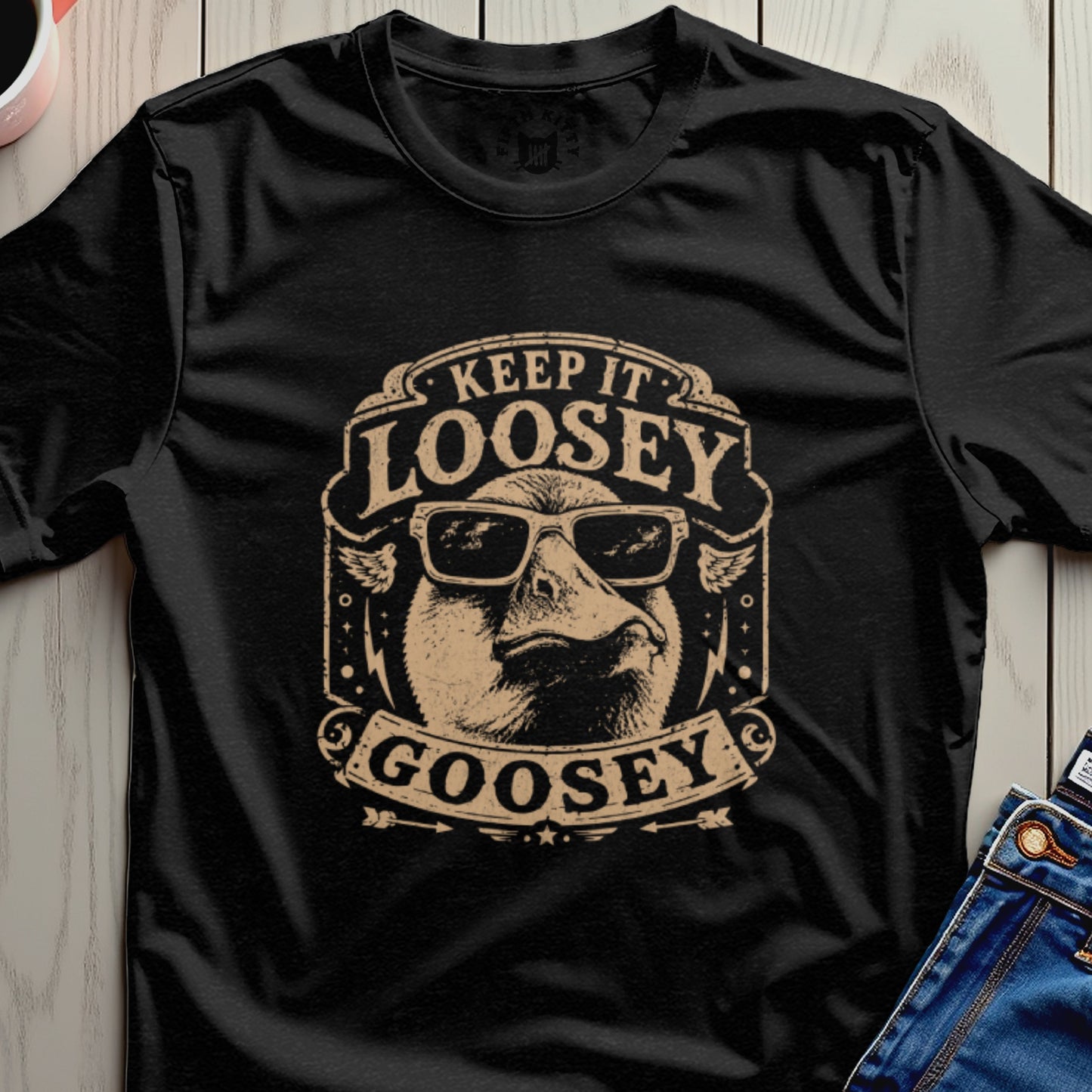 Black t-shirt with "Keep It Loosey Goosey" text and a goose graphic.