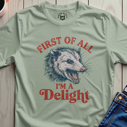 Opossum with open mouth, text "First of all I'm a Delight".