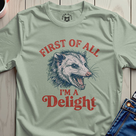 Opossum with open mouth, text "First of all I'm a Delight".