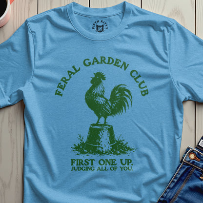 Blue t-shirt with "Feral Garden Club" and a rooster.