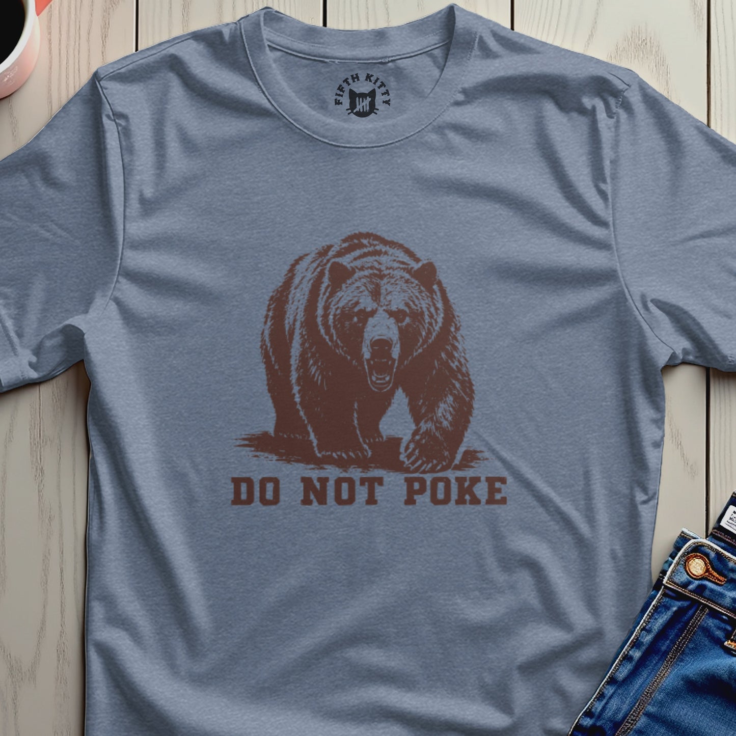 T-shirt with brown bear graphic and "DO NOT POKE" text.