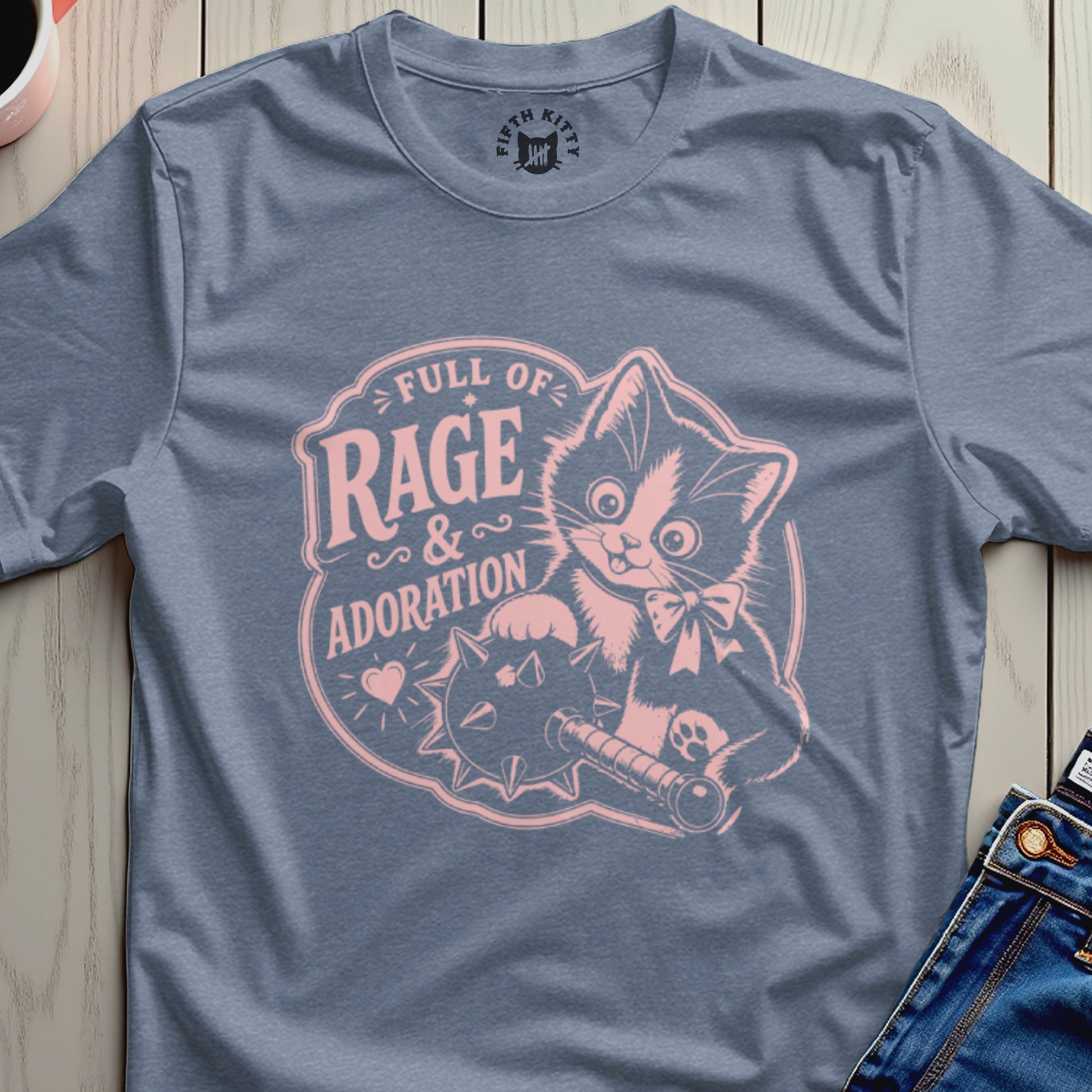 Blue t-shirt with pink graphic of a cat holding a mace, text "Full of Rage & Adoration".
