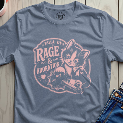 Blue t-shirt with pink graphic of a cat holding a mace, text "Full of Rage & Adoration".