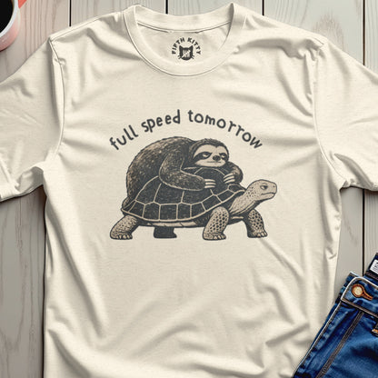 Sloth riding a tortoise with text "full speed tomorrow"