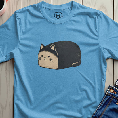A light blue t-shirt with a graphic of a black and tan loaf cat and brand logo.