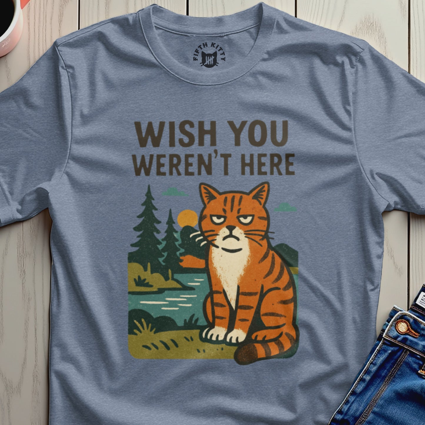 Blue t-shirt with a grumpy orange tabby cat and "Wish You Weren't Here" text.