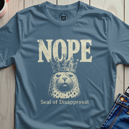 T-shirt with a seal wearing a crown and text "Nope Seal of Disapproval".