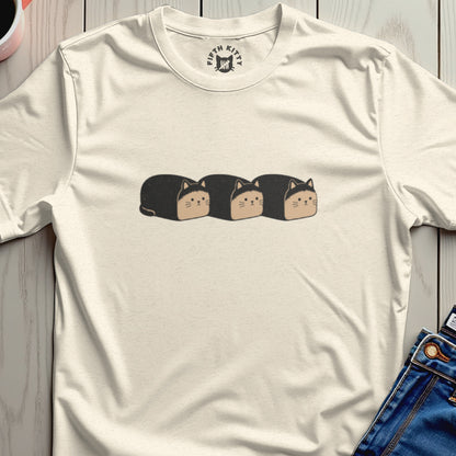 Cream t-shirt with three cartoon cats resembling loaves of bread.