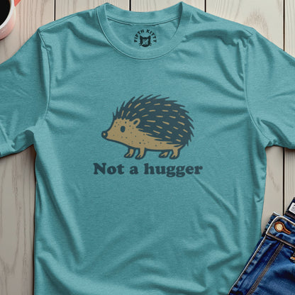 Teal t-shirt with a stylized hedgehog graphic and "Not a hugger" text.