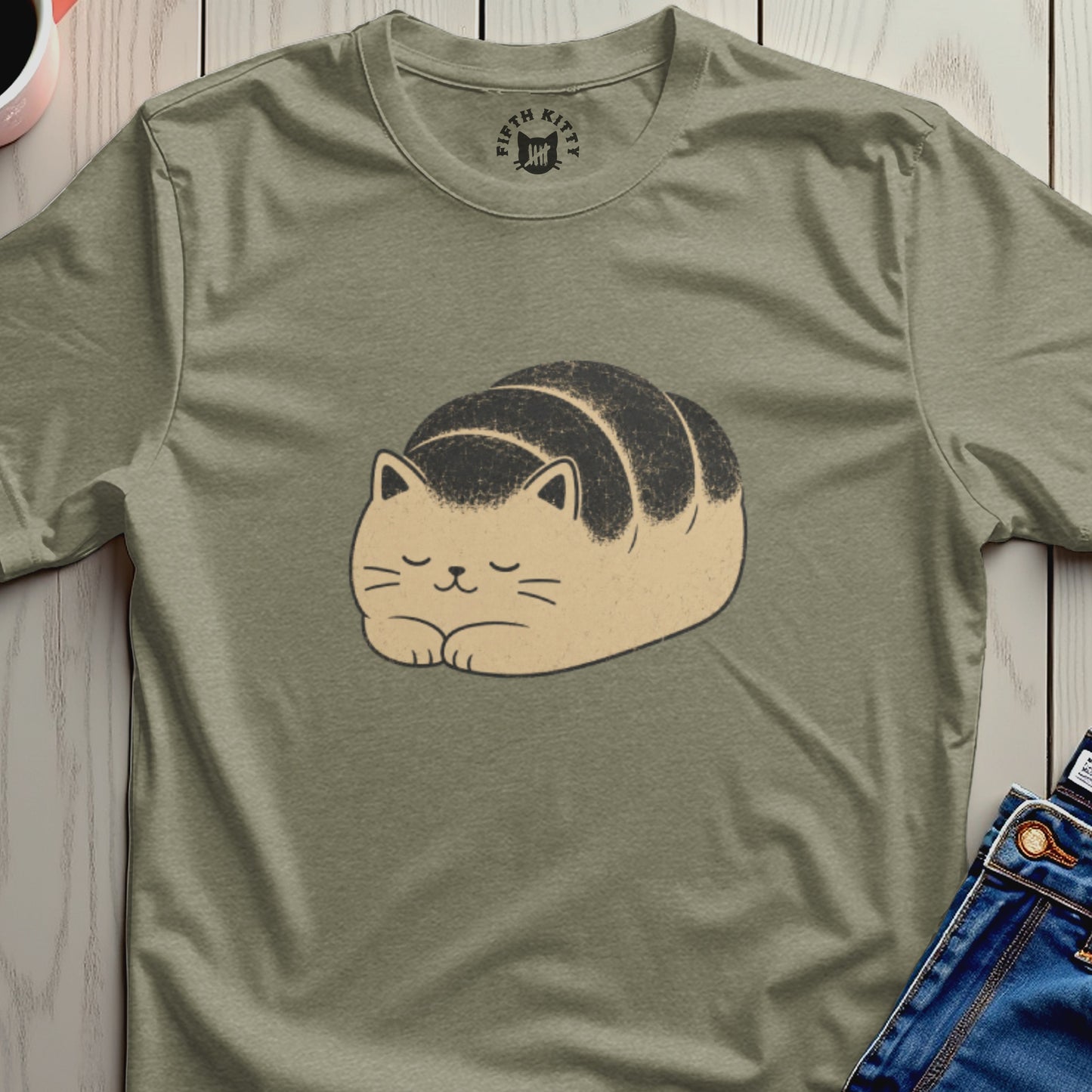 Cat loaf t-shirt with Fifth Kitty logo on the collar.
