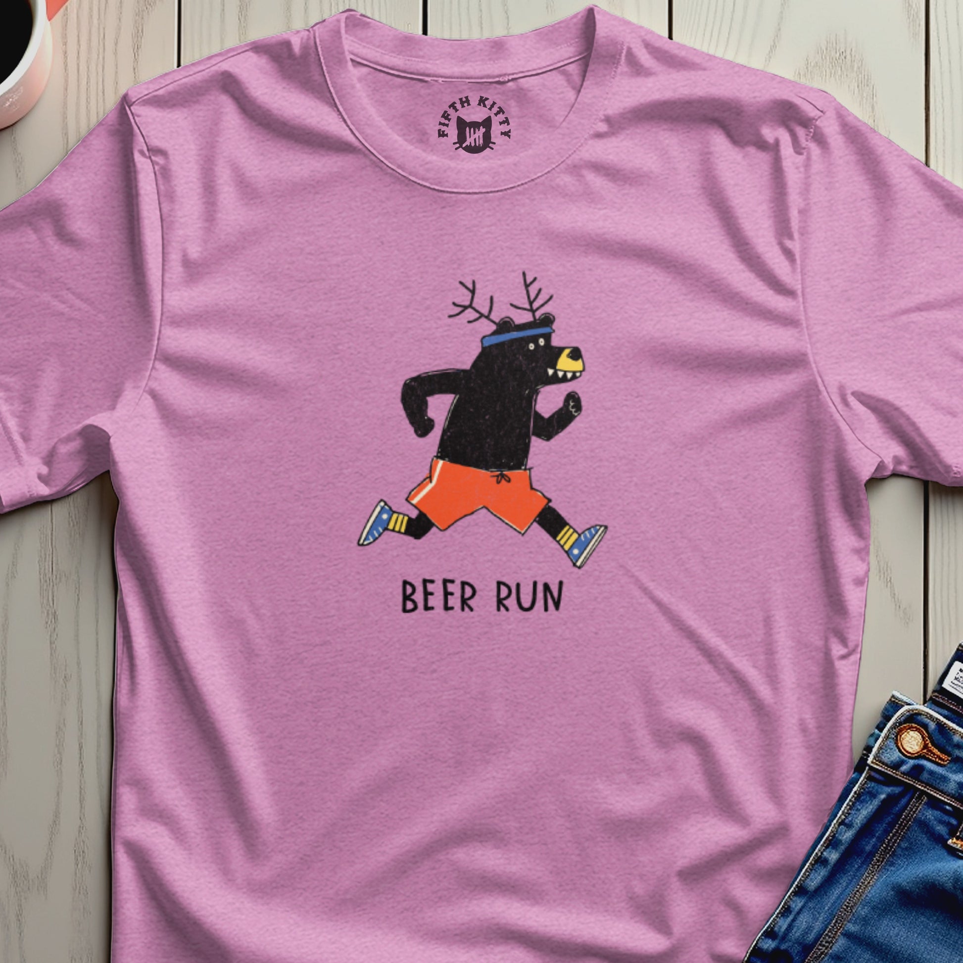 Pink t-shirt with black bear wearing antlers and running shorts, text "BEER RUN".