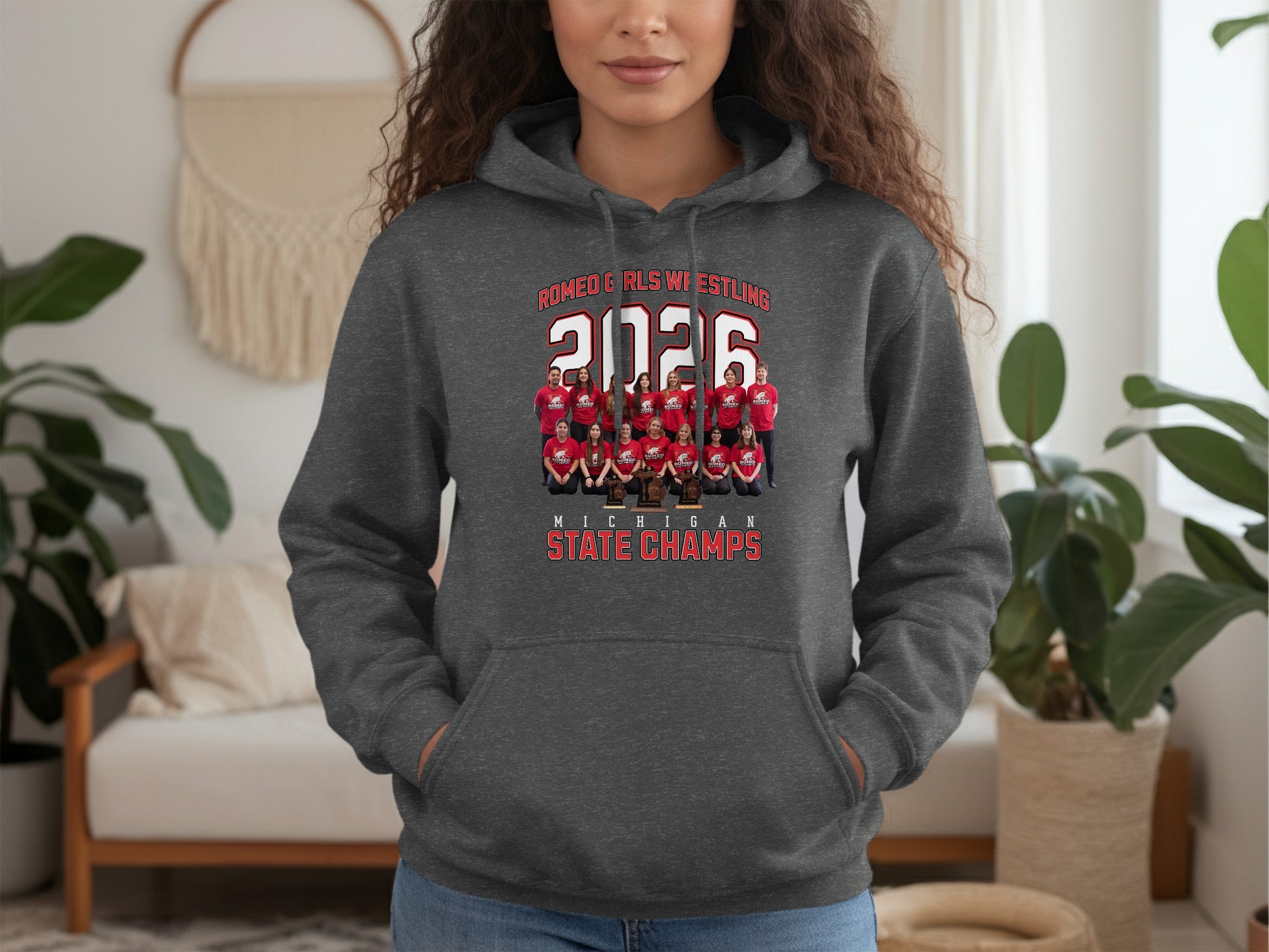 Dark gray hoodie displaying "2026 Romeo Girls Wrestling Michigan State Champs" and team photo.