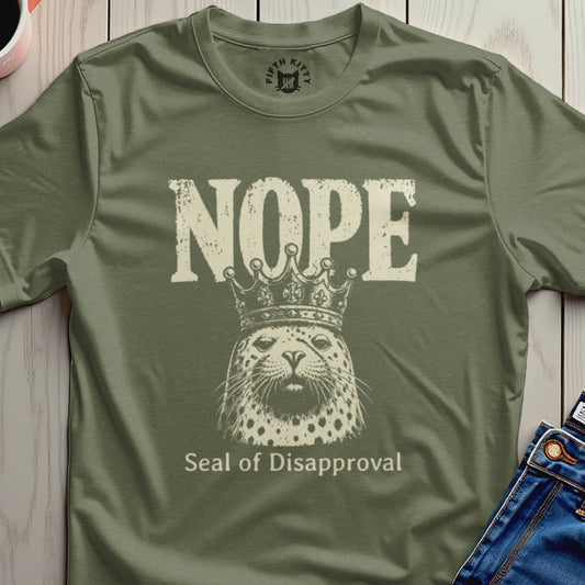 Olive t-shirt with distressed "Nope" text and a leopard wearing a crown with "Seal of Disapproval".