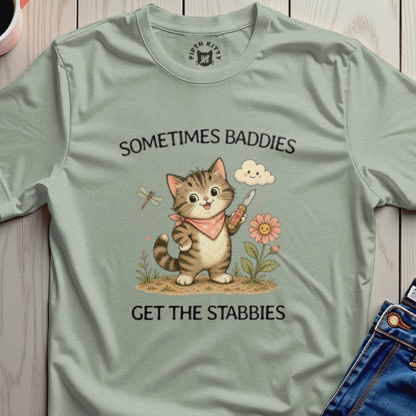 Cute cat with knife and bandana, "Sometimes baddies get the stabies" text.