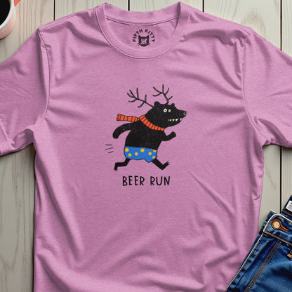 Pink t-shirt with a cartoon bear wearing antlers, scarf, and polka dot shorts.