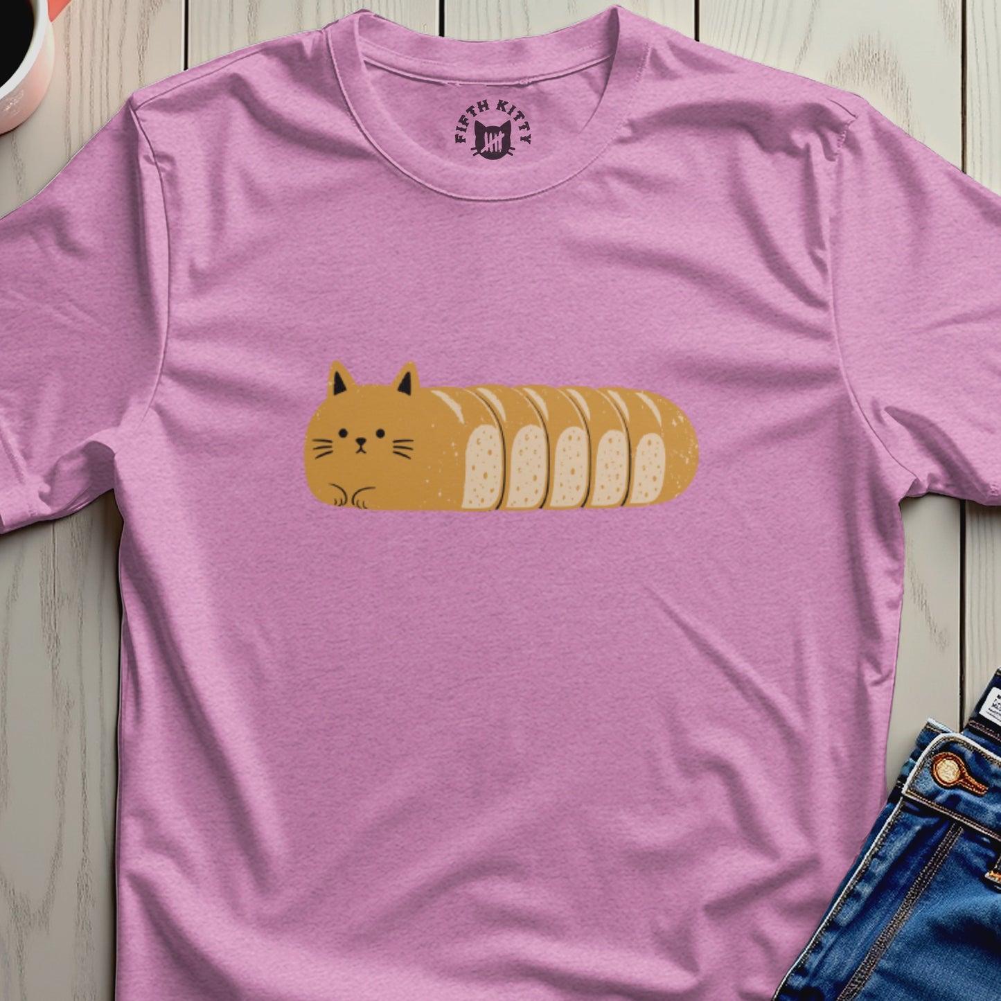 Pink t-shirt with a cartoon cat bread loaf graphic and a "Fifth Kitty" logo.
