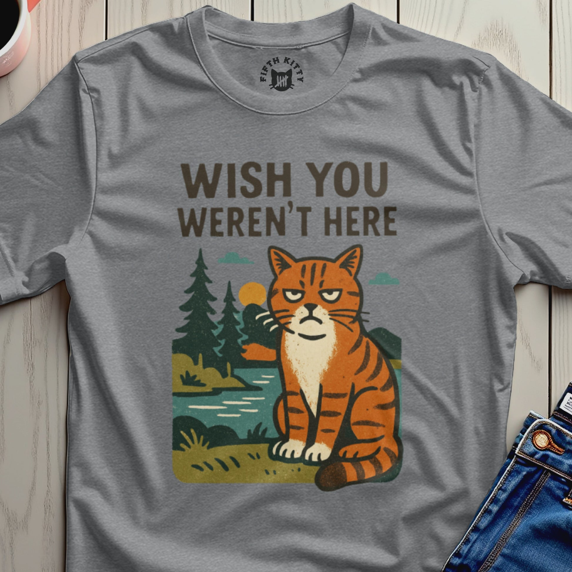 Gray t-shirt with text "WISH YOU WEREN'T HERE" and a grumpy cat illustration.