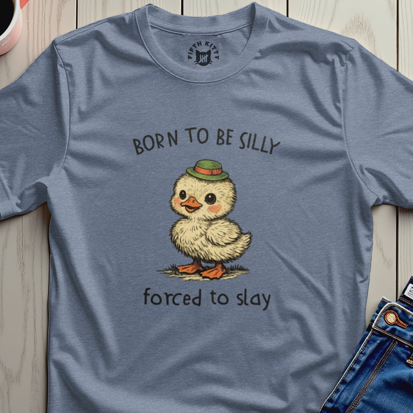 Duckling in a hat with text "BORN TO BE SILLY FORCED TO SLAY".
