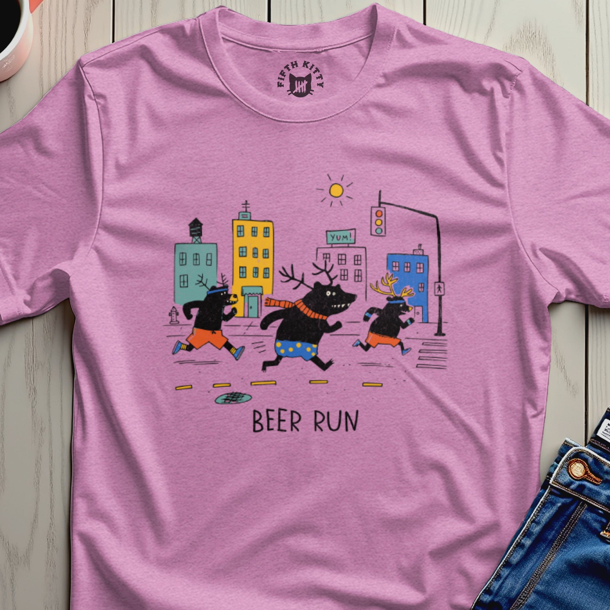 Pink t-shirt with cartoon bears running in a city with text "BEER RUN".