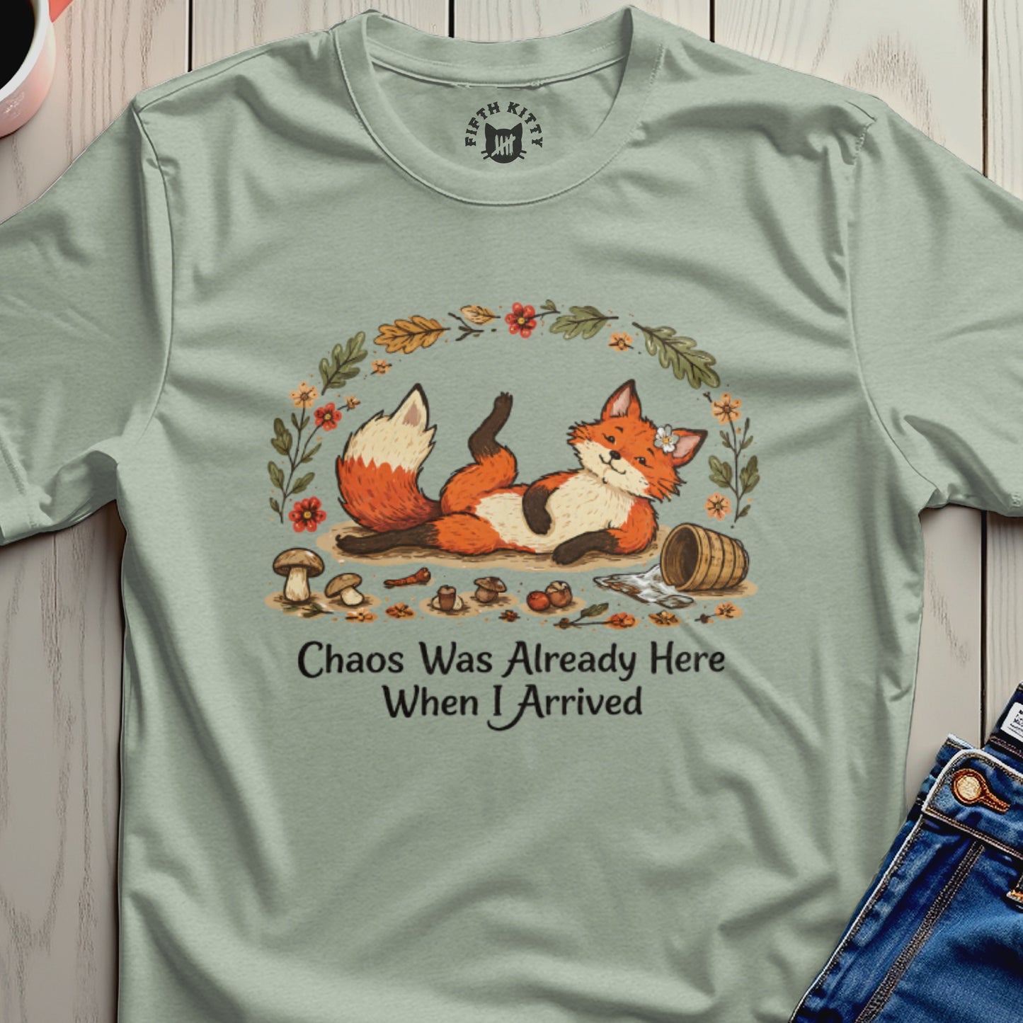 Fox lying down in floral wreath with text "Chaos Was Already Here When I Arrived".