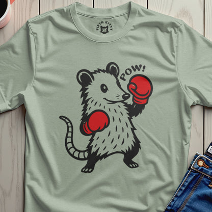 Opossum wearing boxing gloves with the word "POW!" and a Fifth Kitty logo.