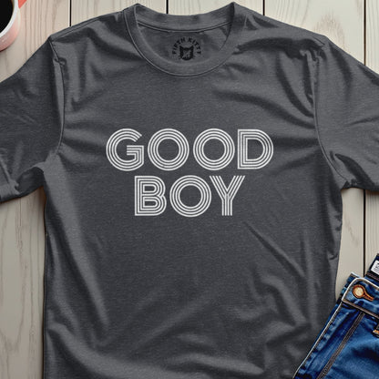 Dark grey t-shirt with white "GOOD BOY" text in horizontal lines.