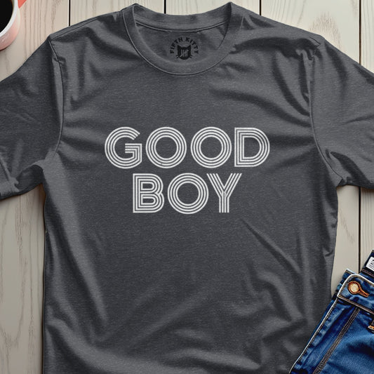Dark grey t-shirt with white "GOOD BOY" text in horizontal lines.