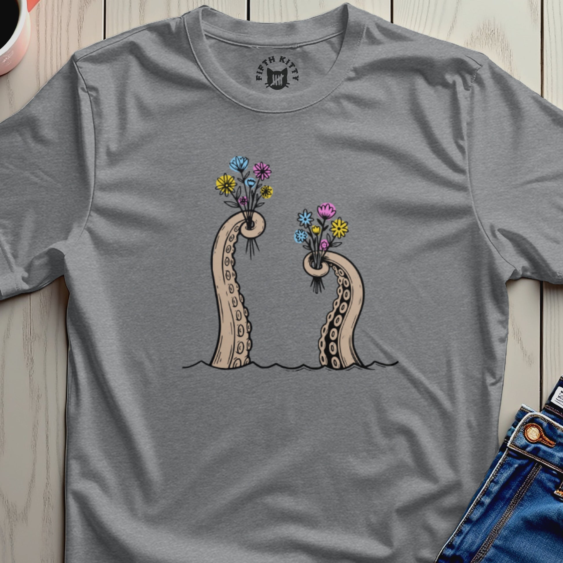 Two octopus tentacles holding bouquets of colorful flowers.