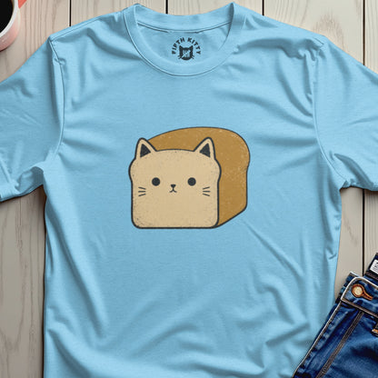 Light blue t-shirt featuring a cartoon cat face on a slice of toast.