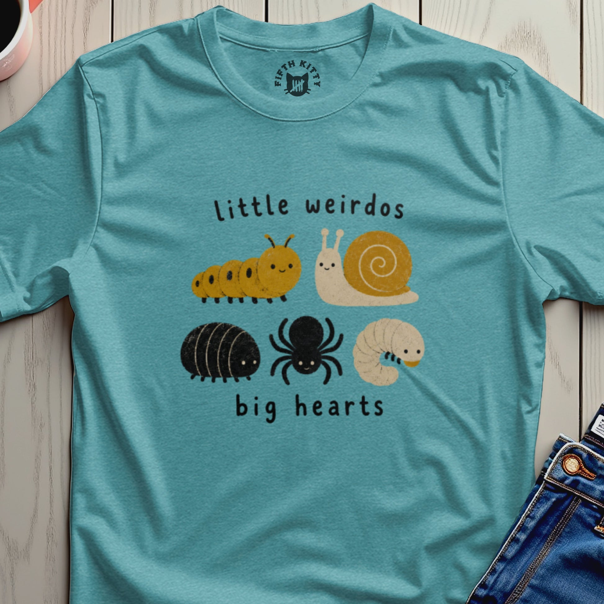 Teal t-shirt with cute illustrations of insects and the words "little weirdos big hearts".