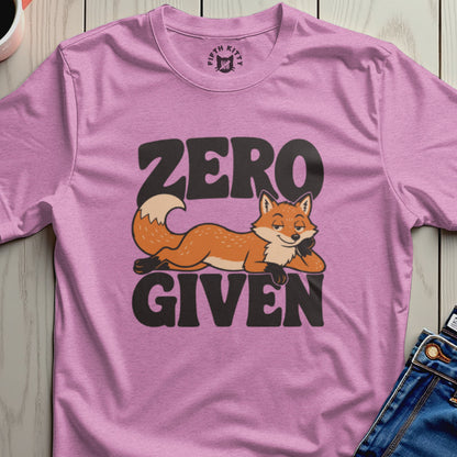 Pink t-shirt with a cartoon fox and the text "ZERO GIVEN".