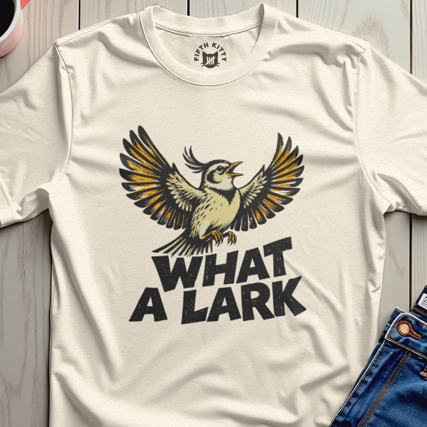 Bird with outstretched wings above text that reads "WHAT A LARK".
