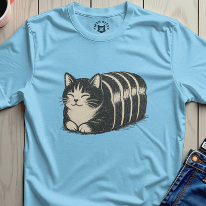 Light blue t-shirt with a black and white striped cat graphic and a circular logo