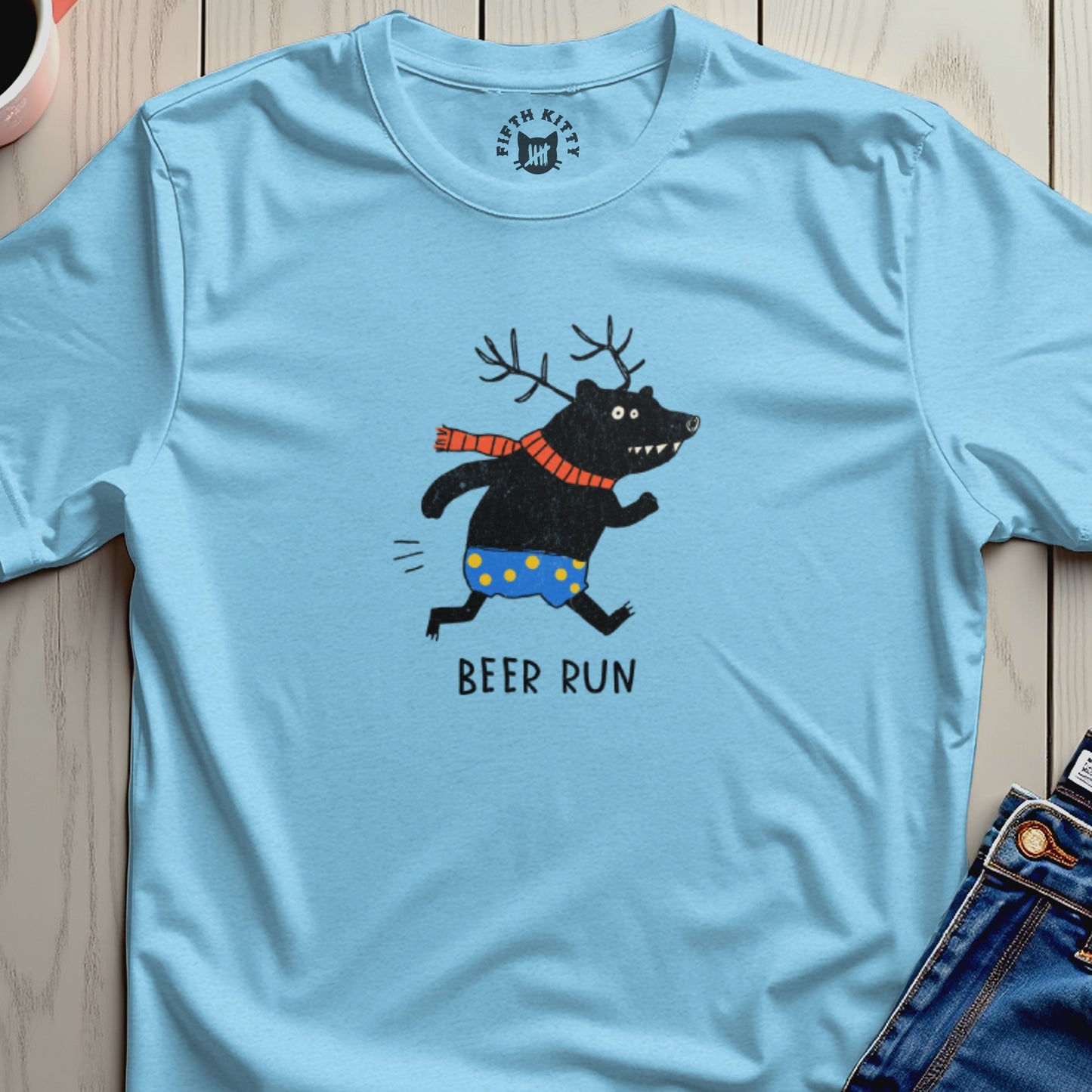 Light blue t-shirt with a black bear wearing a scarf and polka dot shorts, with "BEER RUN" text.