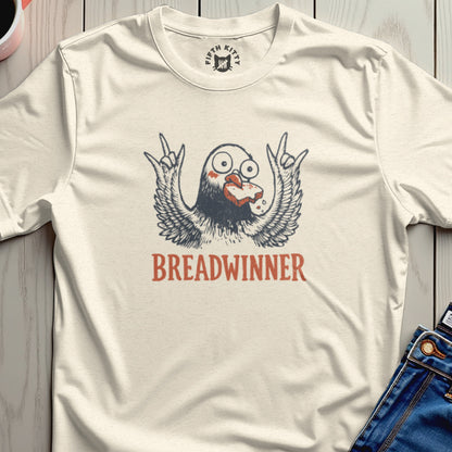 Cream shirt with "Breadwinner" text and cartoon bird holding toast.