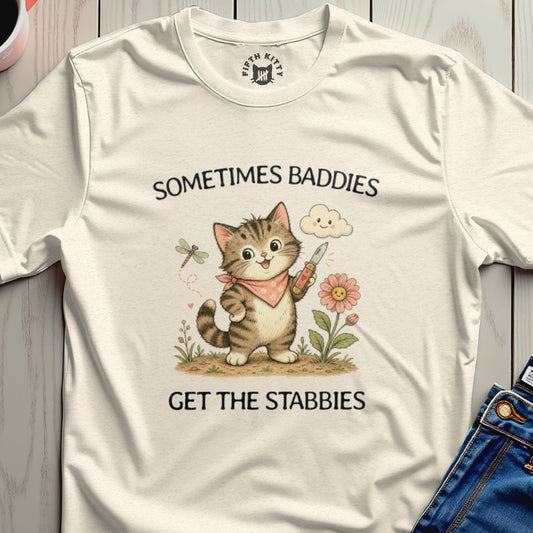 Cat holding knife with text "Sometimes Baddies Get the Stabies".