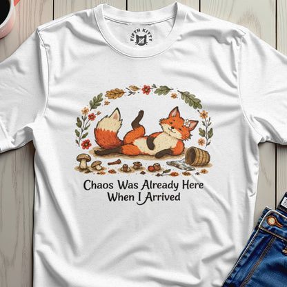 White t-shirt with a relaxed fox illustration and text "Chaos Was Already Here When I Arrived".