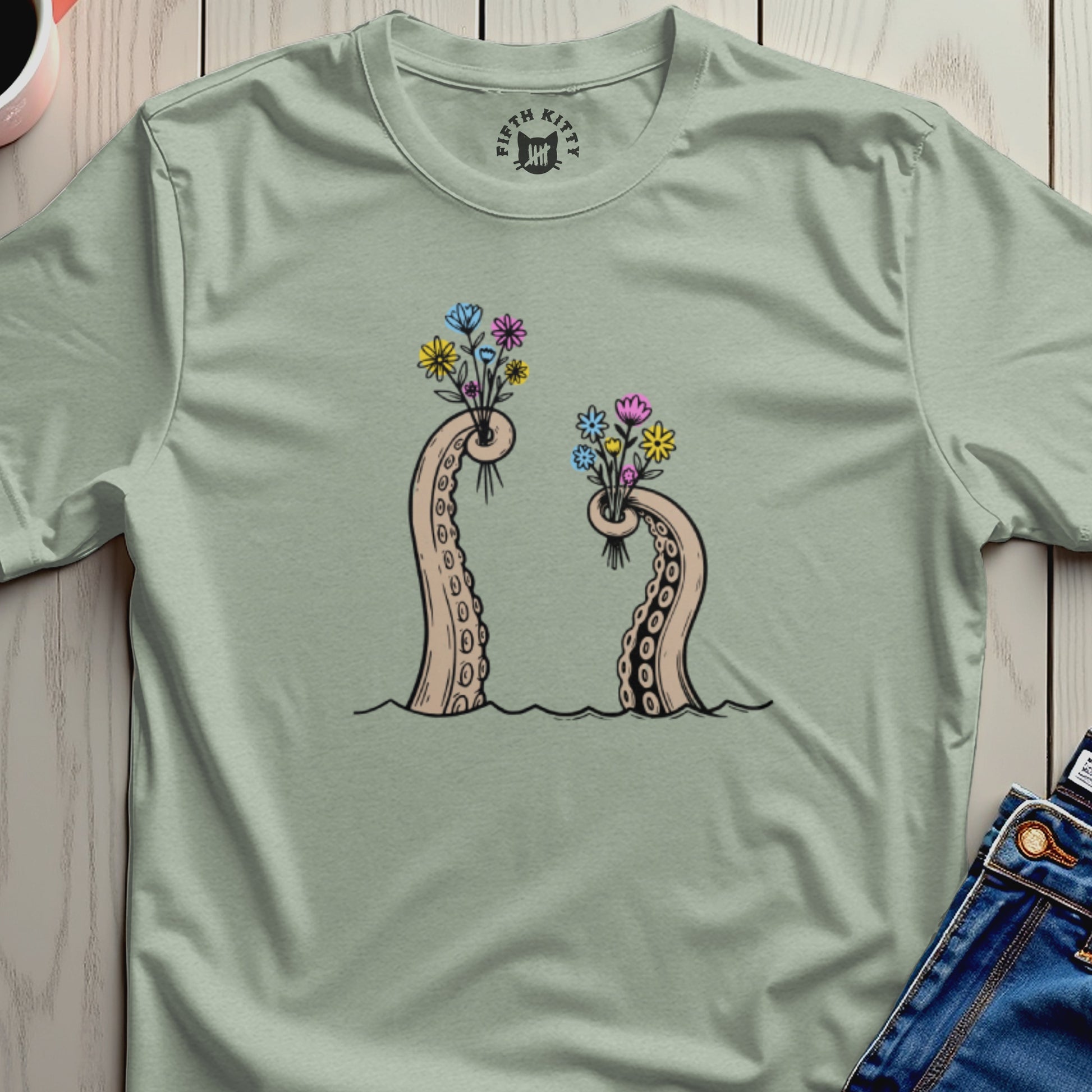 Two octopus tentacles emerge from water holding bouquets of colorful flowers.