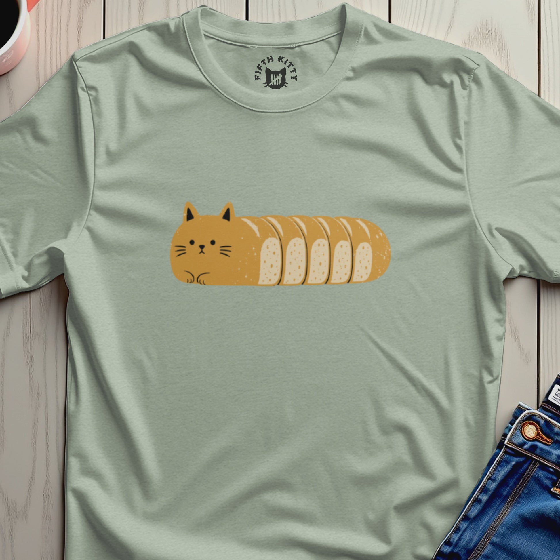 Light green t-shirt with a cartoon cat-loaf design and "FIFTH KITTY" logo.